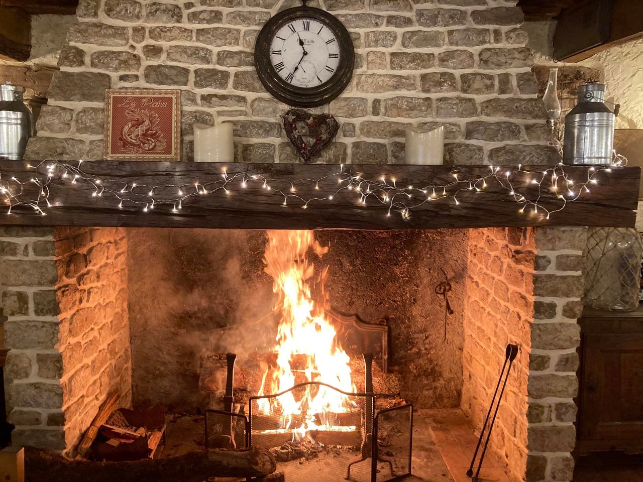 ‘Our’ table in front of the roaring fire.